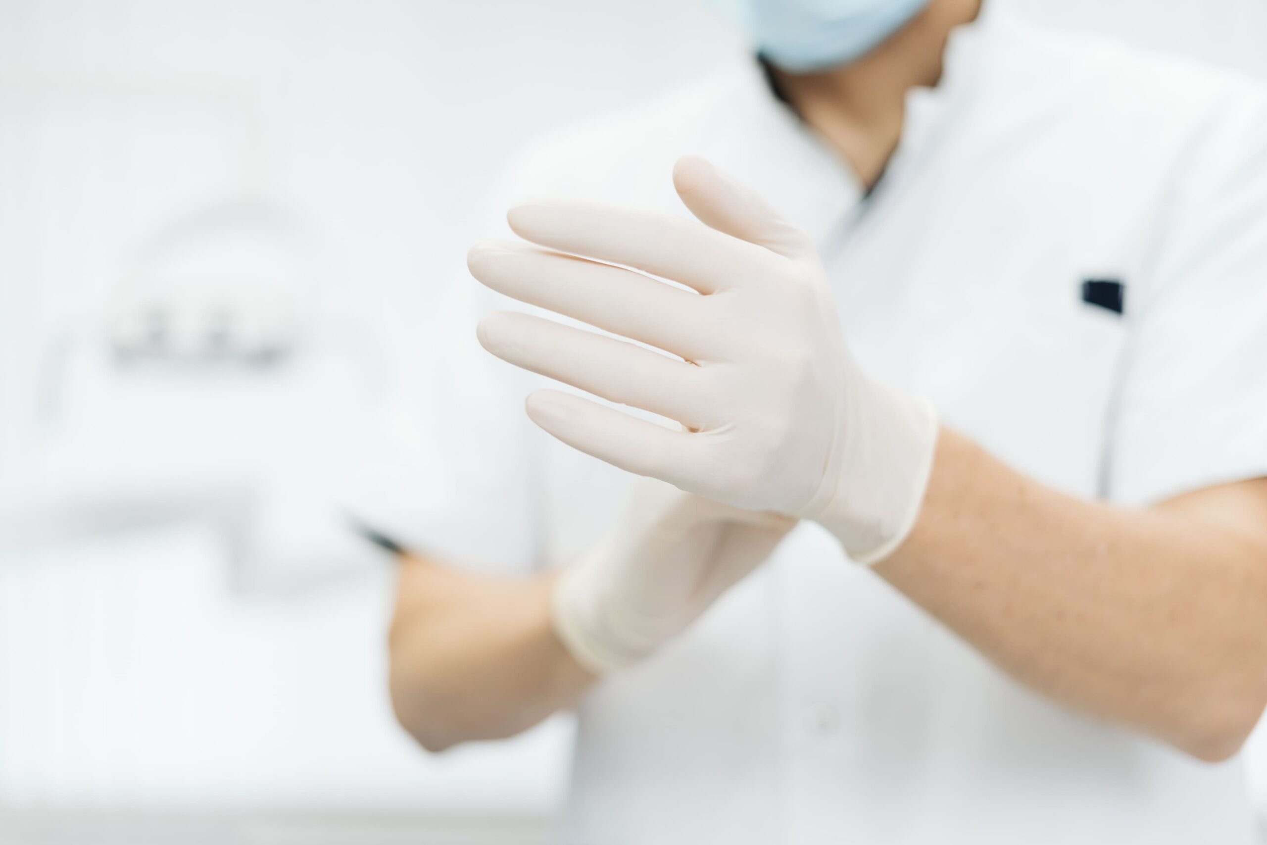 Doctor wearing gloves for Haemorrhoids diagnosis